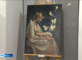 Выставка "Вечный светоч материнства и детства"